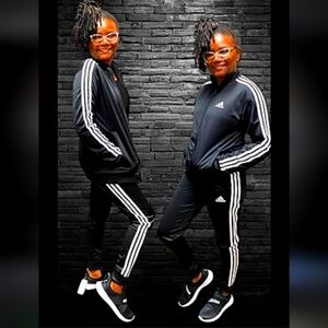 Nike  3 piece sweatsuit women's LG black with white stripes